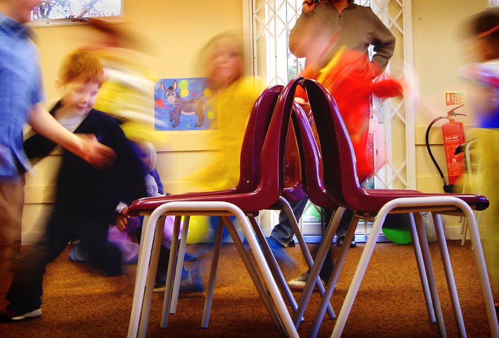 Games for Preschool Groups musical chairs promote rhythm and coordination
